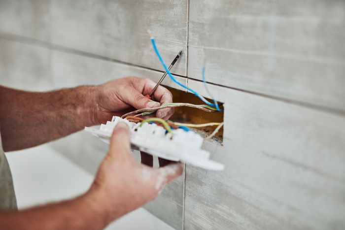 electrician repairing wiring